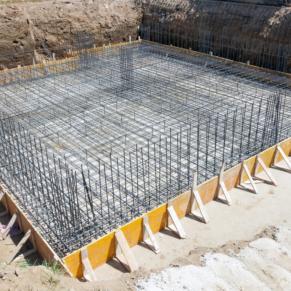 Rebar set on chairs inside forms before a concrete pour